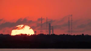 SLS rocket silhouetted at dawn