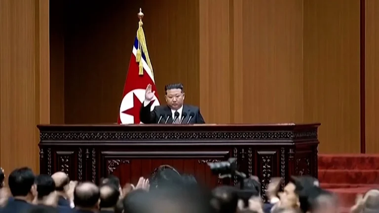 Kim Jong Un stands resolute in military attire