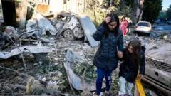 Russian strikes kill 22: Ukraine rescuers pull dead from rubble