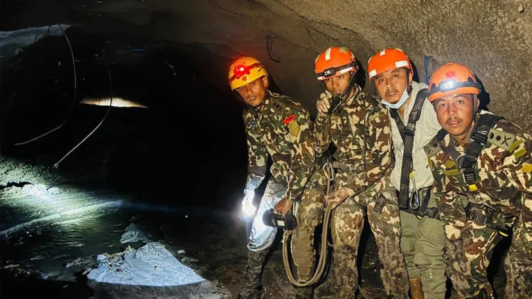 Rescue workers in Nepal flood