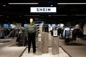 Shein CEO wealth plunge illustration